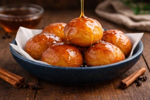 Buñuelos nicaragüenses con miel de caña doraditos y dulces